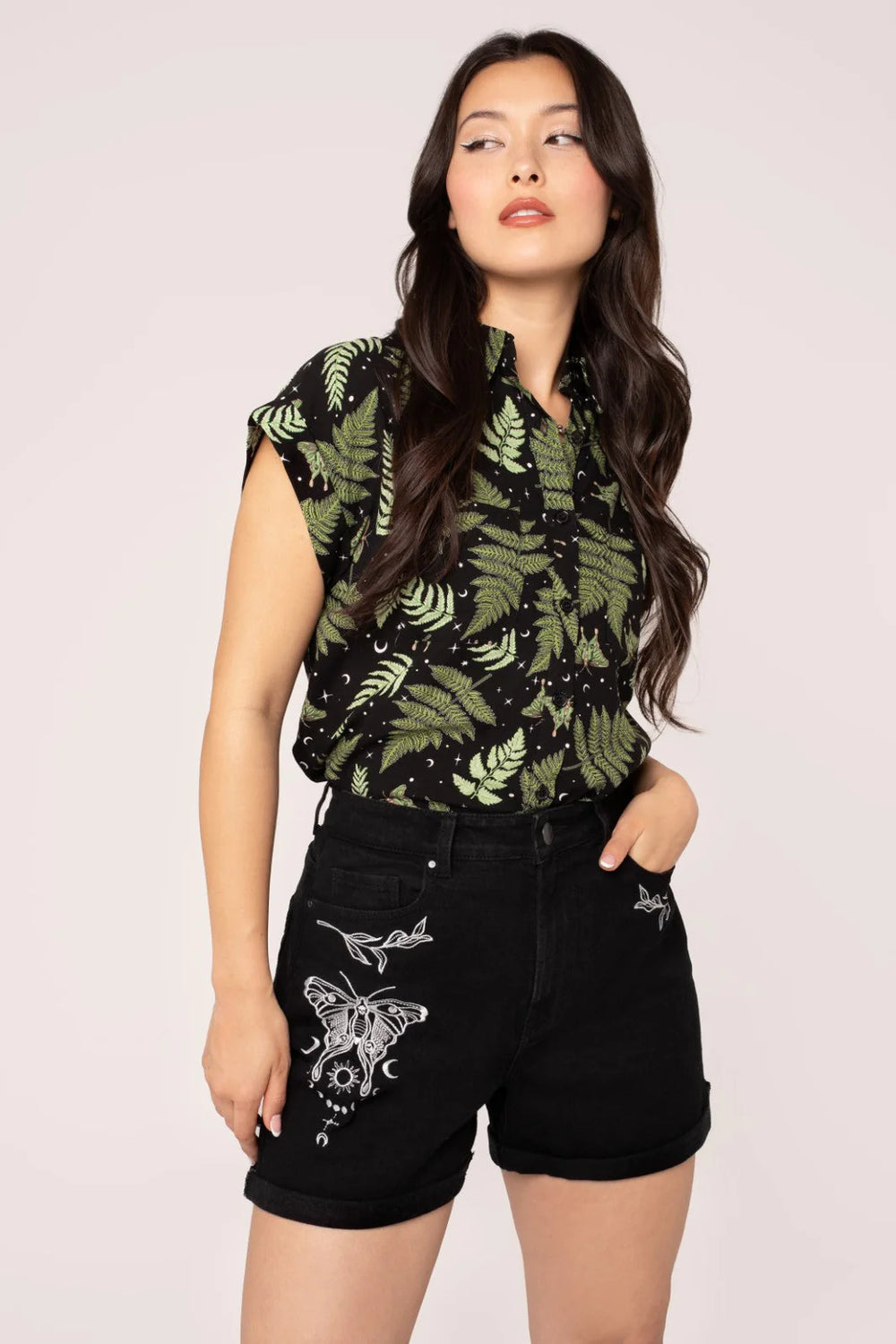 Hell Bunny Metamorphosis off black denim shorts with white celestial moth and leaf embroidery