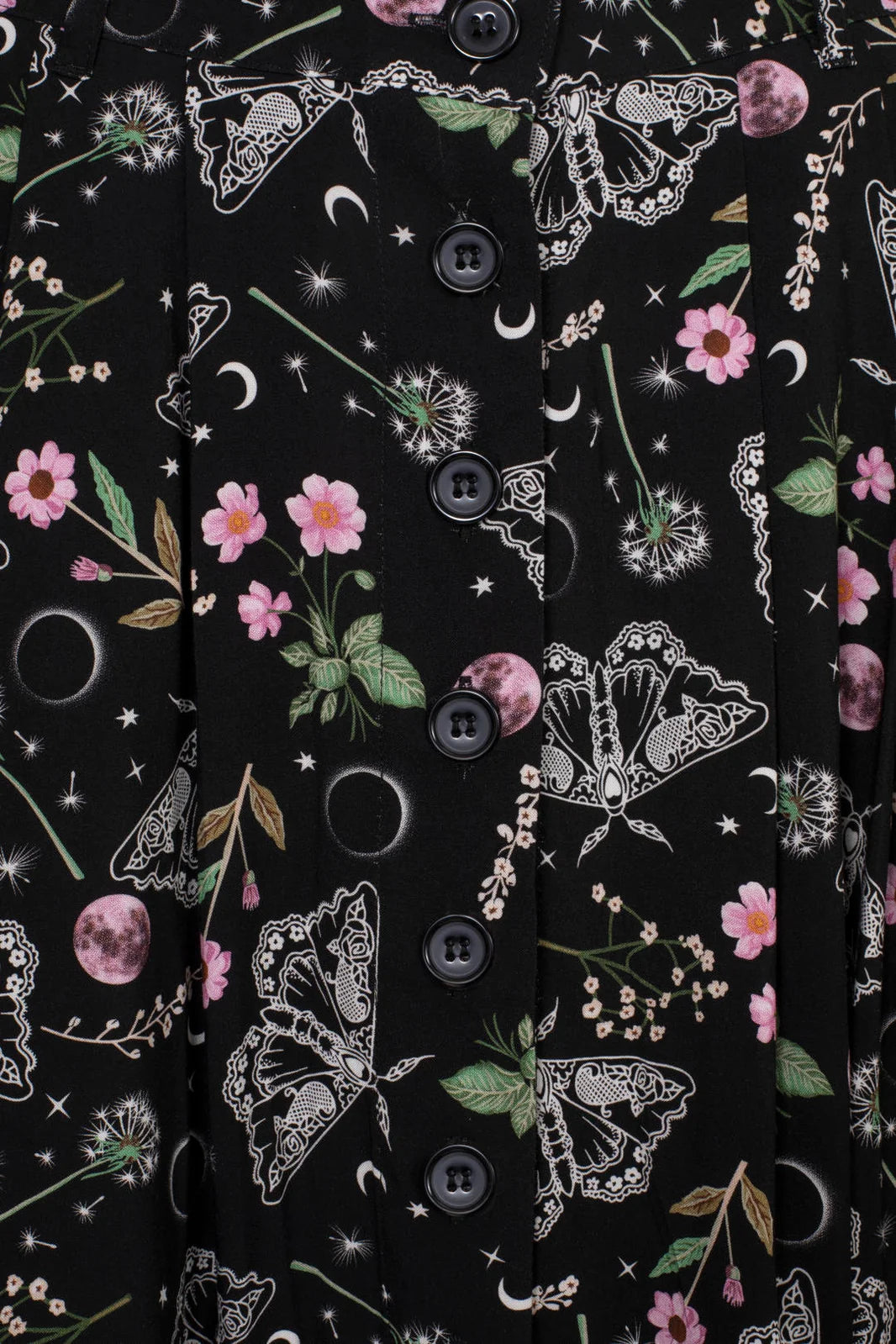 Close up of Hell Bunny Chrysalis Skirt moth moon floral print and black button front