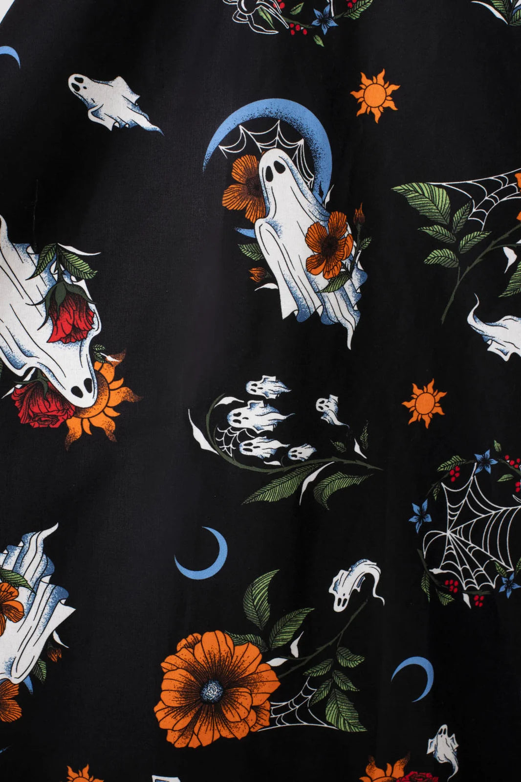 Close up of Hell Bunny Ghost Flower Skirt showing ghost floral moon and spiderweb print