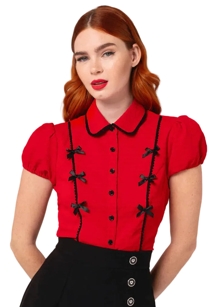 Hell Bunny Casey red blouse with black ribbon bows, black trim collar and button front worn by model