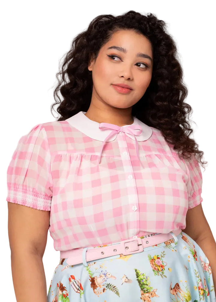 Hell Bunny Cindy pink and white gingham blouse with white collar and ribbon tie worn by model