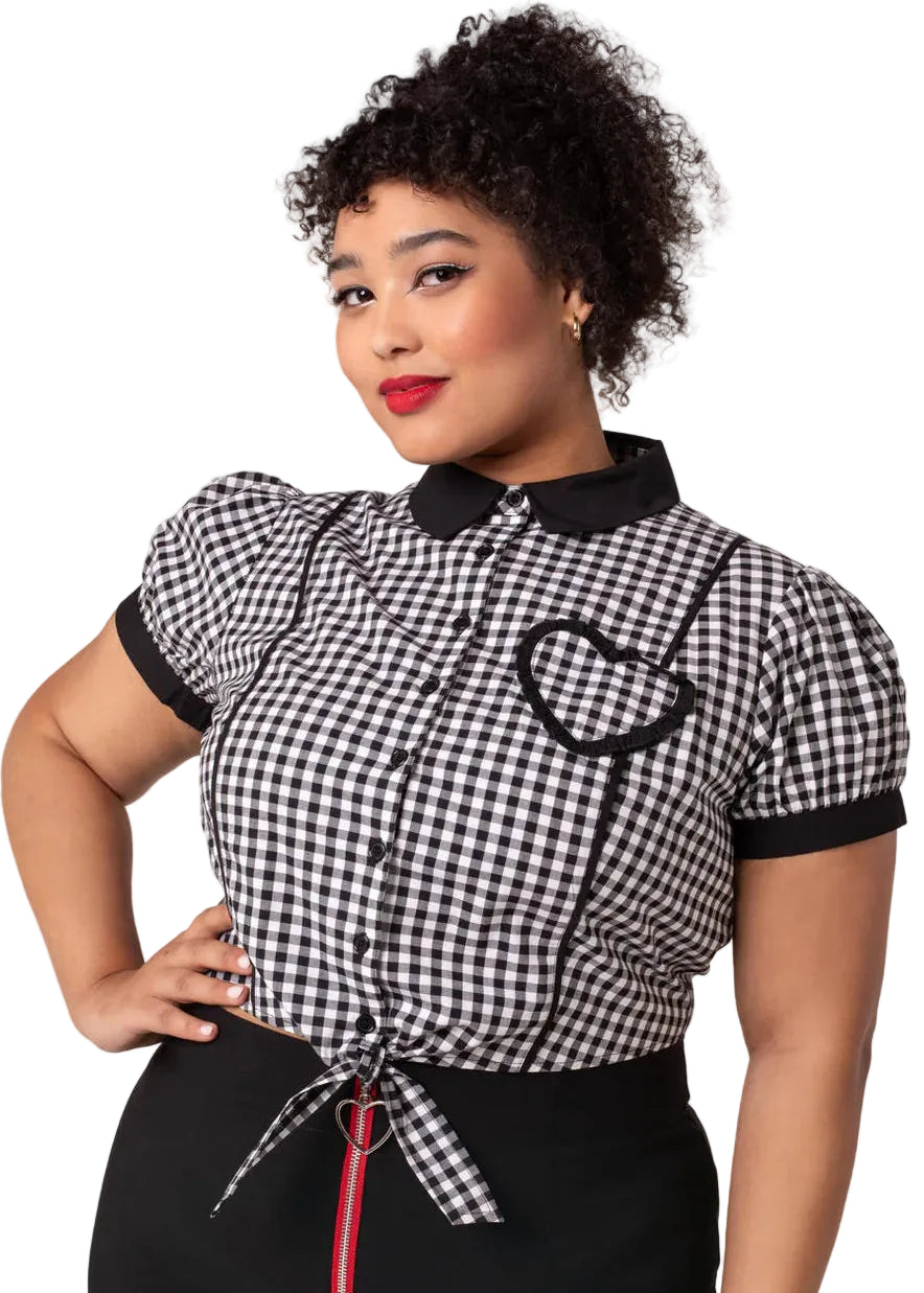 Hell Bunny Mel black and white gingham blouse with black heart pocket detail and tie front worn by model