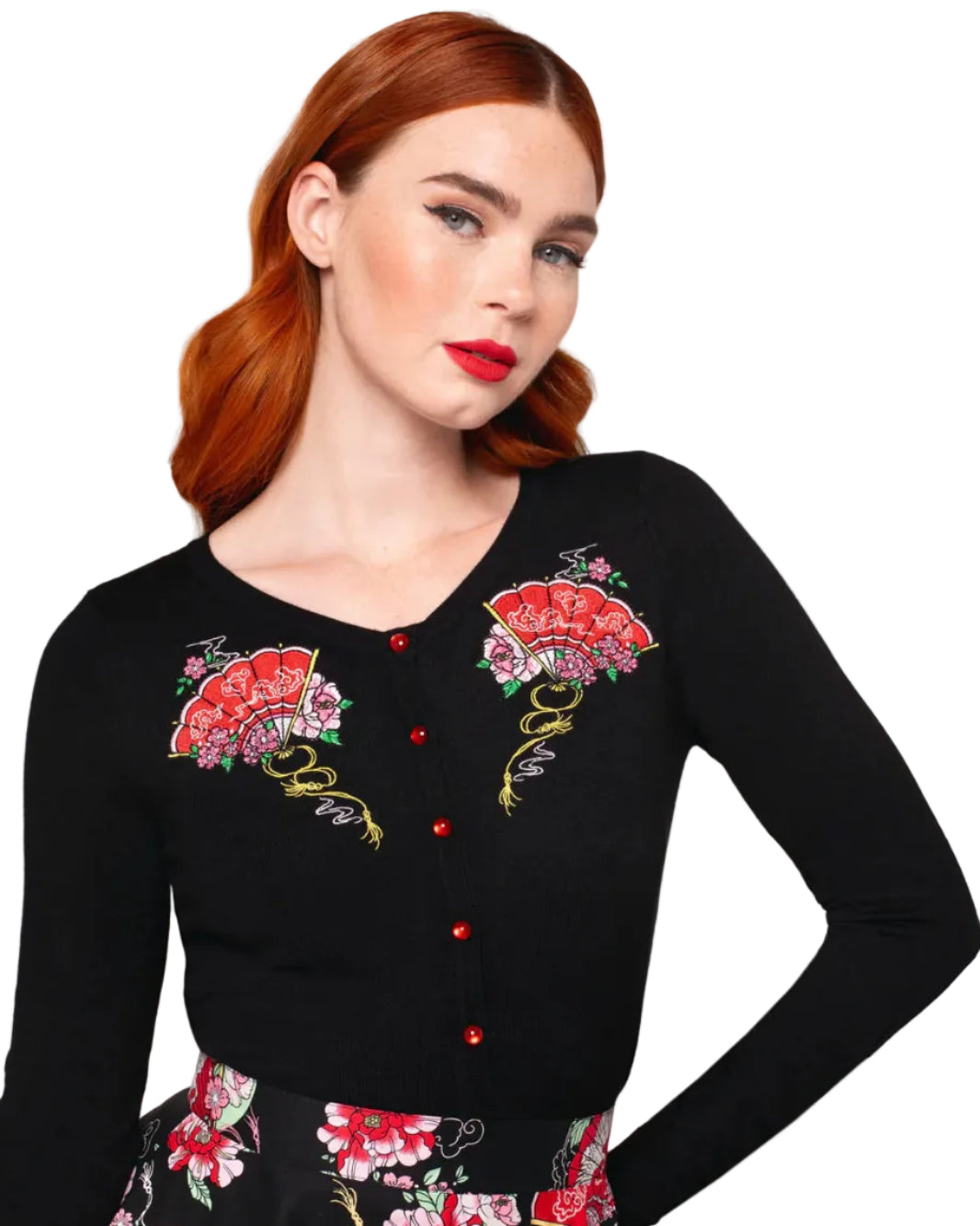 Black fitted cardigan with red fan and pink floral embroidery and red buttons worn by model
