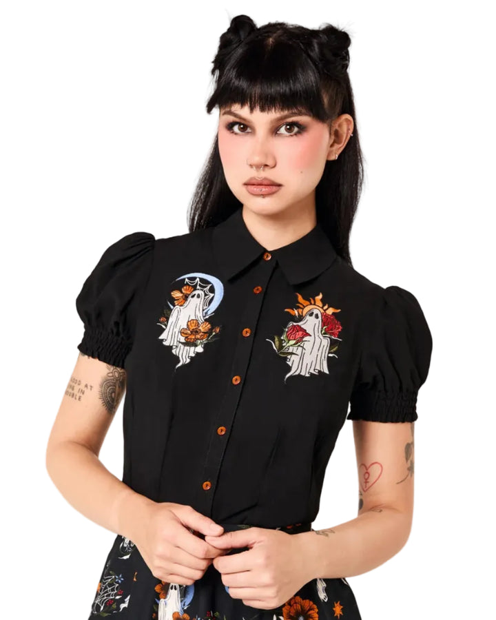 Model wearing Hell Bunny Ghost Flower black embroidered blouse with puff sleeves