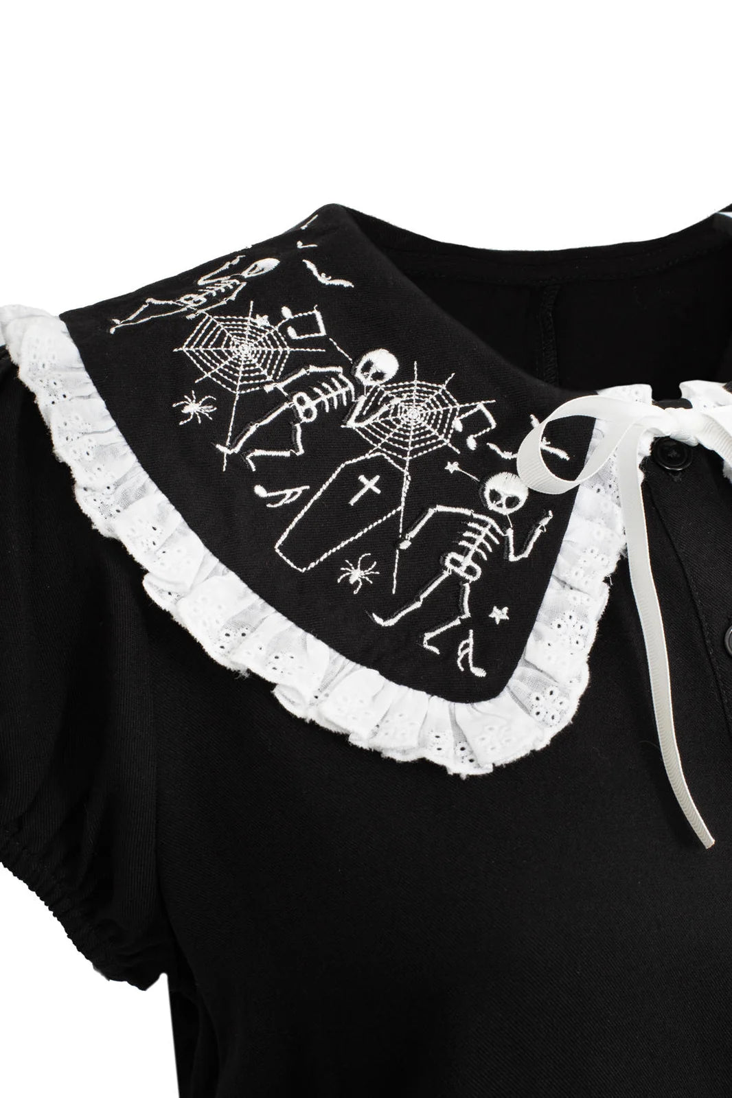 Close up of Hell Bunny Danse Macabre blouse collar with skeleton coffin and spiderweb embroidery