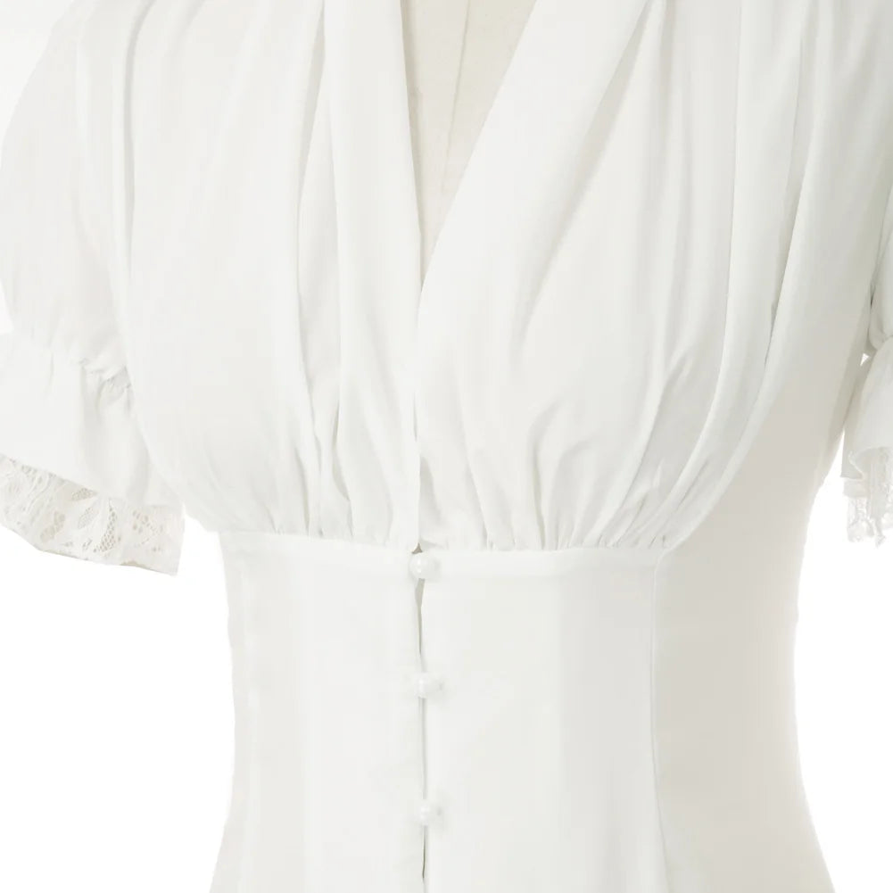 White dress with lace details on a white background