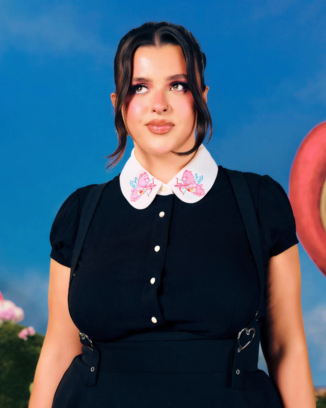Hell Bunny x Care Bears™ Love-A-Lot black blouse with white embroidered collar, pearly buttons and short puff sleeves