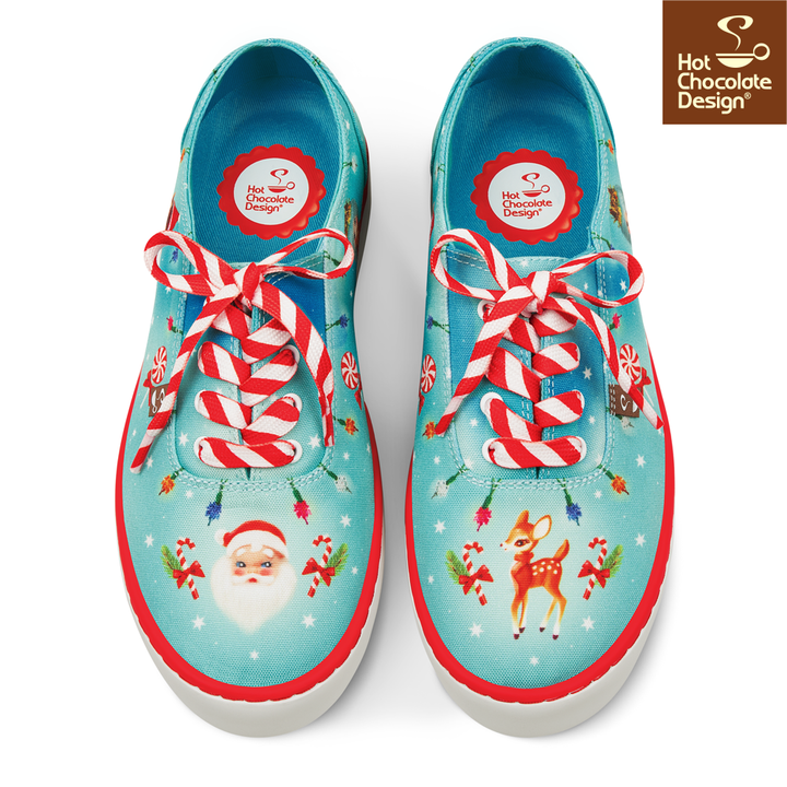 Hot Chocolate Design - Kitsch Christmas Sneakers with festive Santa and deer print, red laces on turquoise shoe.