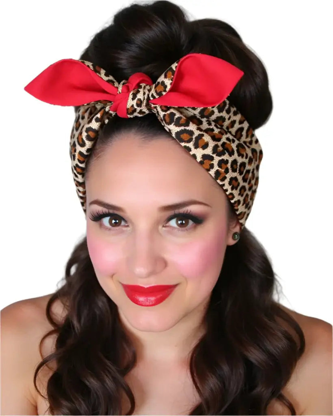 Woman wearing La Cheetah leopard print wired rockabilly hair tie, featuring a red bow, showcasing stylish vintage vibes.