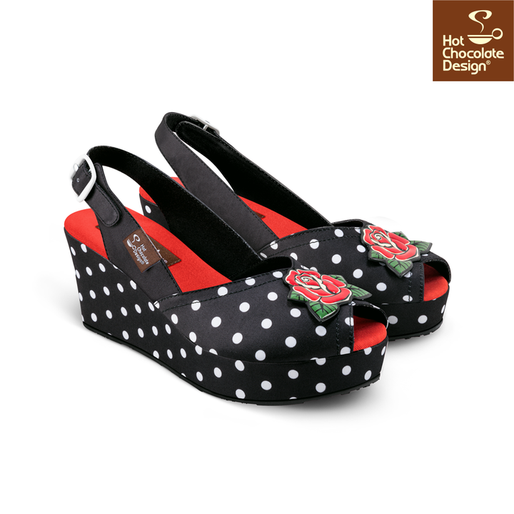 Hot Chocolate Design - Rockabilly Sandal featuring a black and white polka dot pattern with rose embellishments.