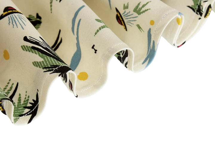 Decorative fabric with bird and leaf pattern on a white background