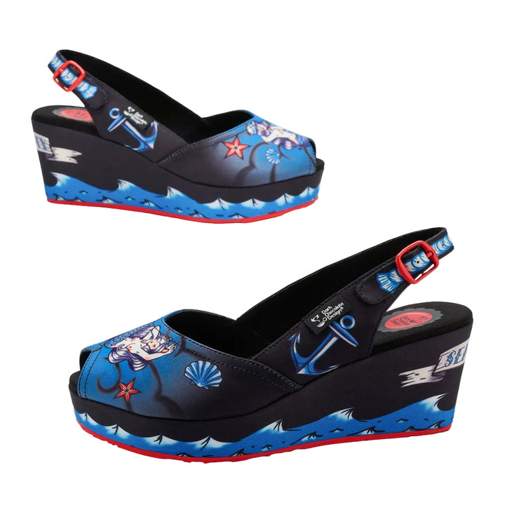 Black wedge sandals with blue and red accents featuring nautical designs on a white background.