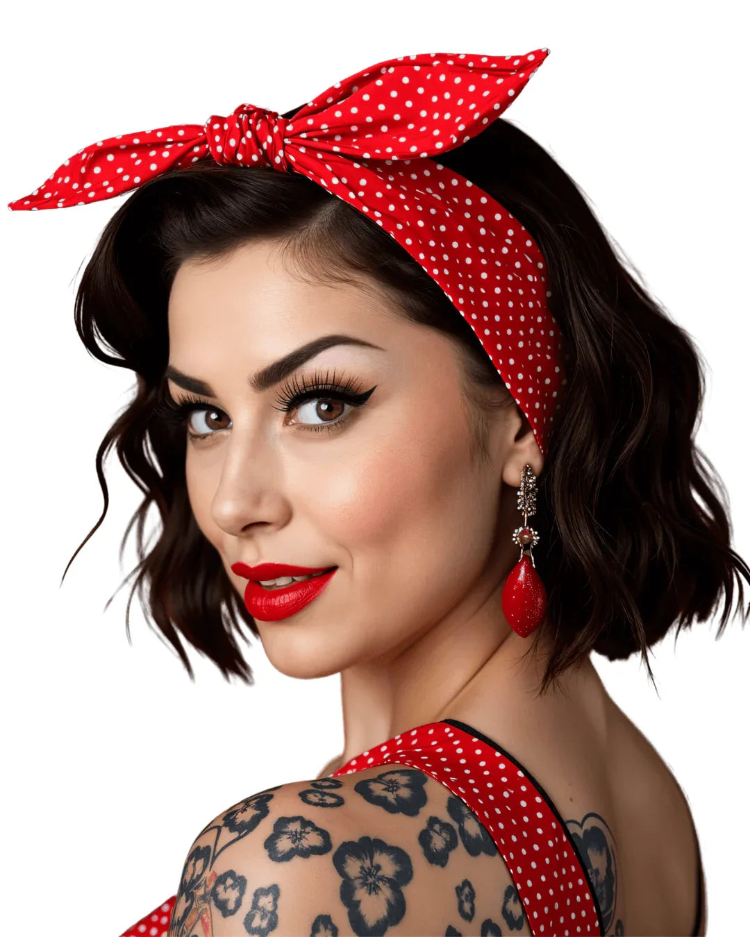 Model showcasing a red polka dot wired hair tie, embodying rockabilly style with vintage flair.