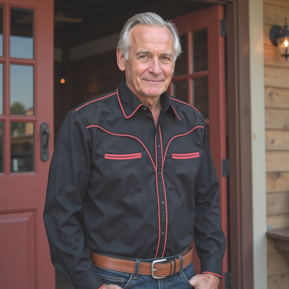 Men's vintage style black western shirt with red piping and long sleeves, perfect for casual or formal occasions.