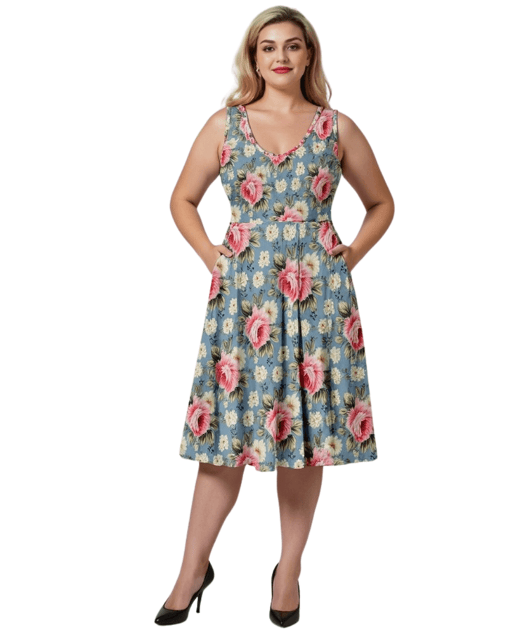 Model wearing Vintage Roses V-Neck Skater Dress with pockets in blue floral print, showcasing effortless chic style.