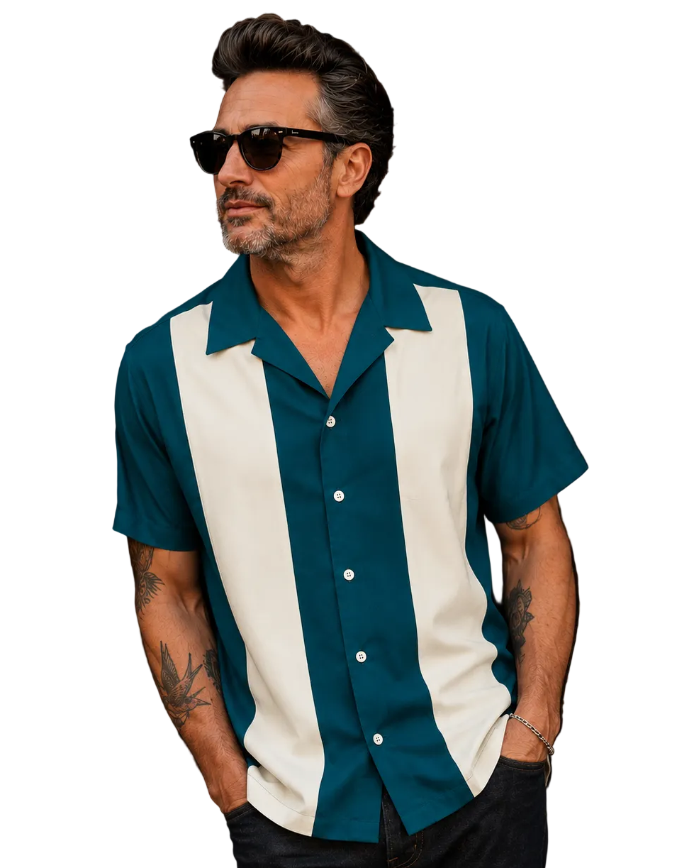 A man wearing a short-sleeve button-up shirt with vertical teal and cream stripes, paired with black pants and sunglasses, against a plain white background.