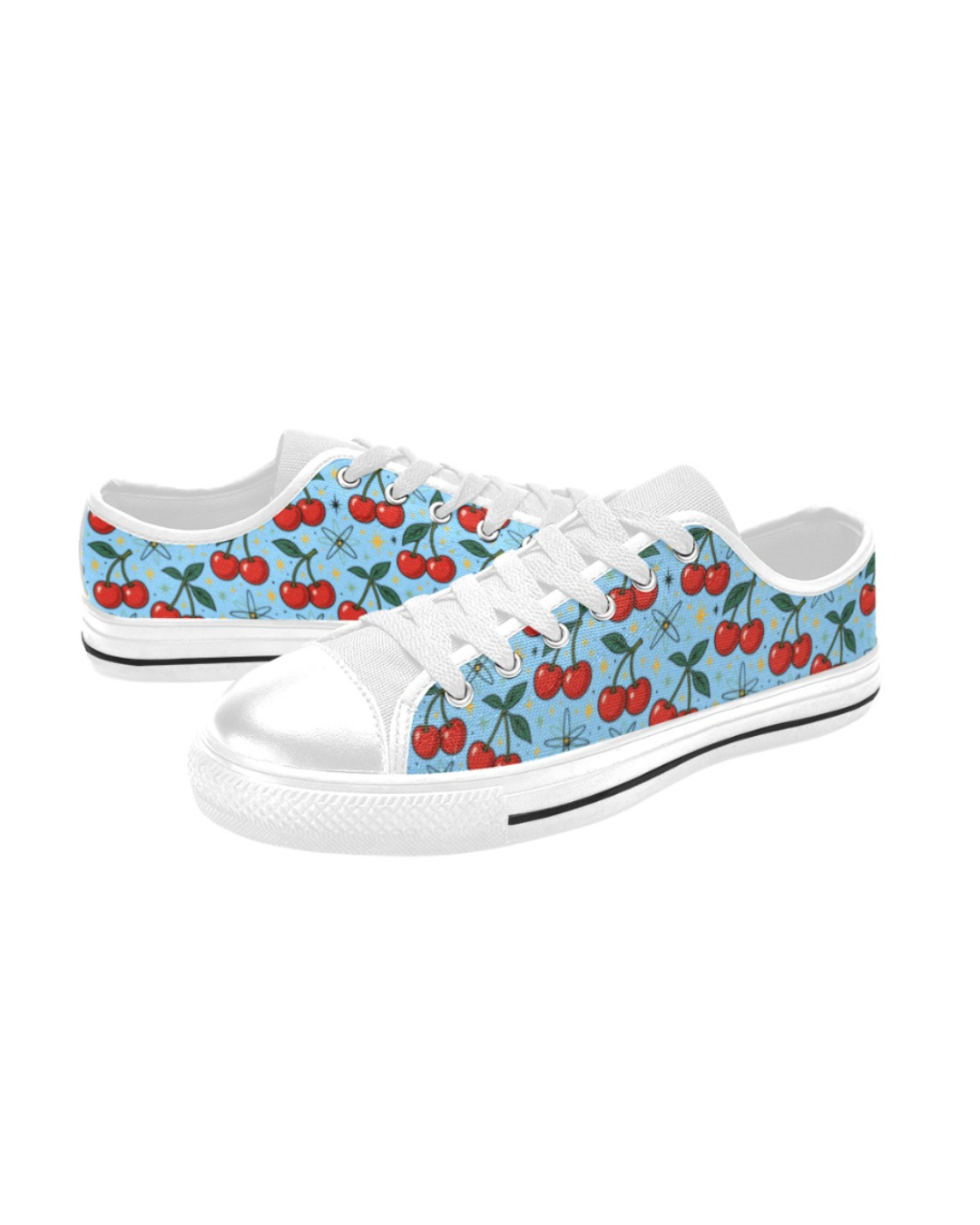 Atomic Cherries Kids Sneakers featuring a playful cherry design on a light blue canvas upper with white lace-up closure.