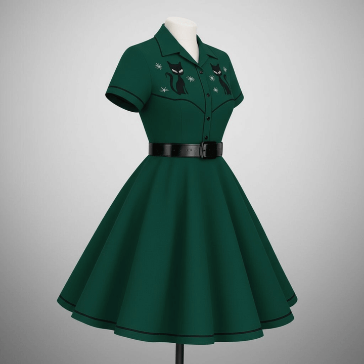 Atomic Kitty Retro Diner Top featuring a fitted silhouette and playful mid-century charm with black piping.