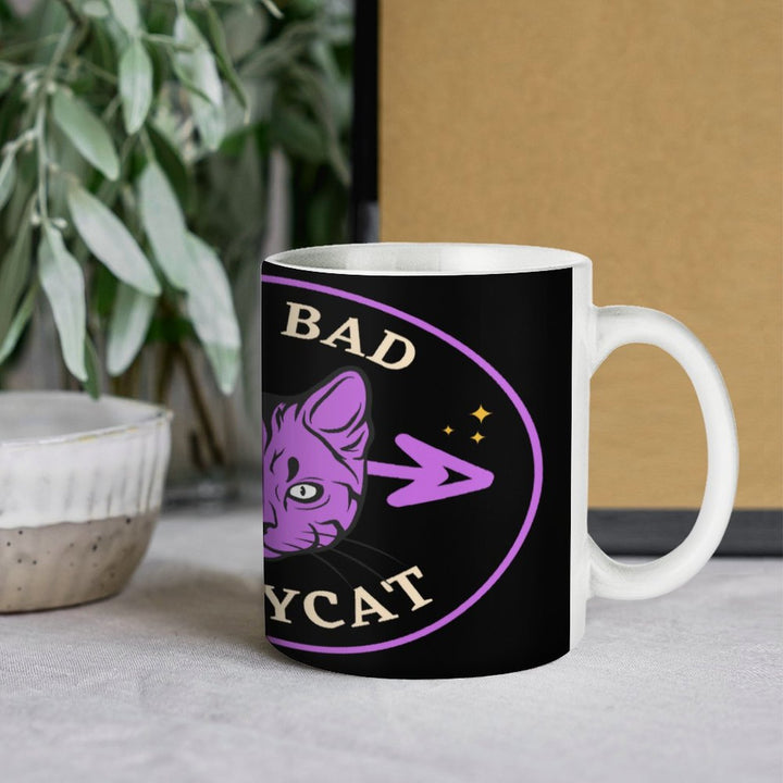 Bad Bad Kitty Cat white ceramic mug with retro design, perfect for coffee and tea, featuring a playful cat graphic.