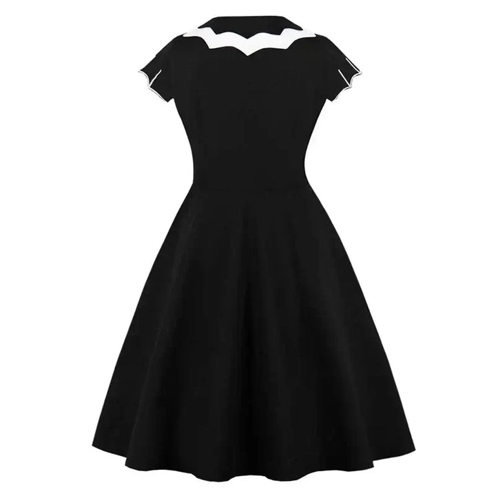 Back view of the Bat Embroidered Vintage A-Line Halloween Dress showcasing its cap sleeves and classic silhouette.