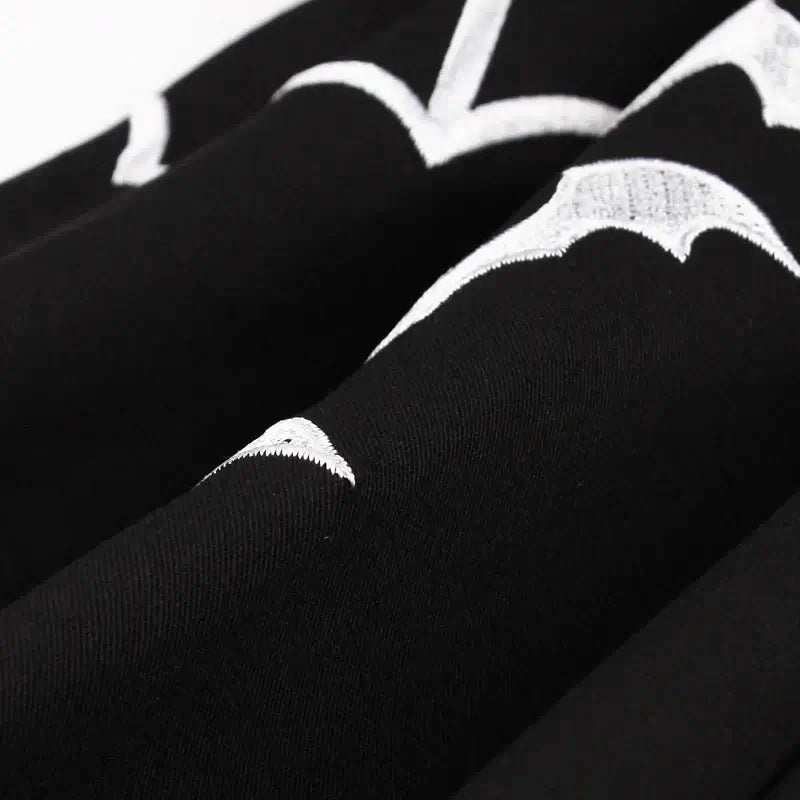 Detail of bat embroidery on fabric of Bat Embroidered Vintage A-Line Halloween Dress.