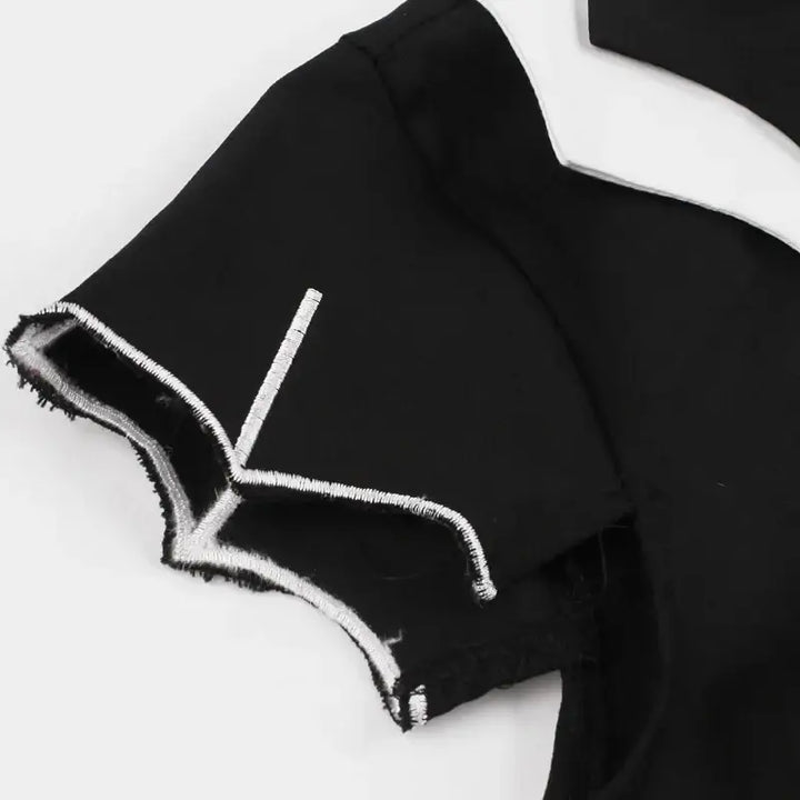 Close-up of the sleeve detail on the Bat Embroidered Vintage A-Line Halloween Dress, showcasing elegant bat embroidery.