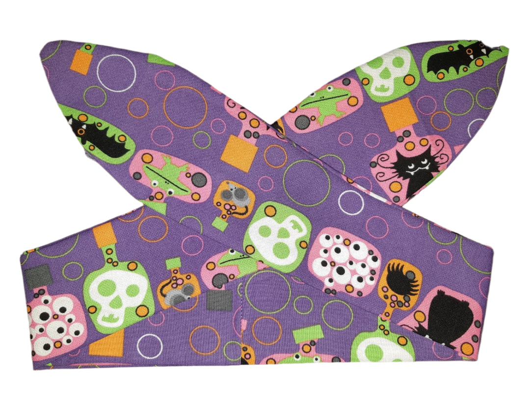 Cats n Bats Rockabilly hair tie with purple skull and bat print, handmade in Australia, perfect for spooky hairstyles.