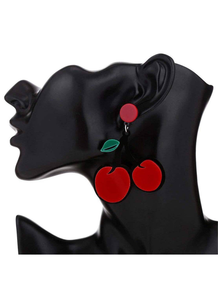 CHERRIES Acrylic drop earrings on a black mannequin, featuring a red cherry design and zinc alloy stud post.