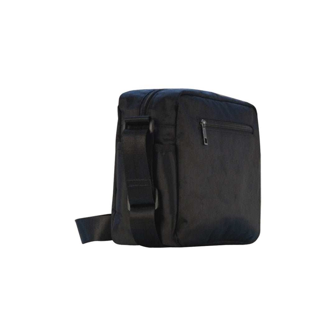 Compact black crossbody bag with adjustable strap and front zipper pocket, perfect for everyday use.