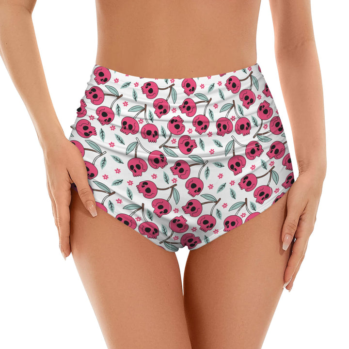 Cherry skulls high waist bikini separates showcasing bold print and retro design, perfect for beach or pool.