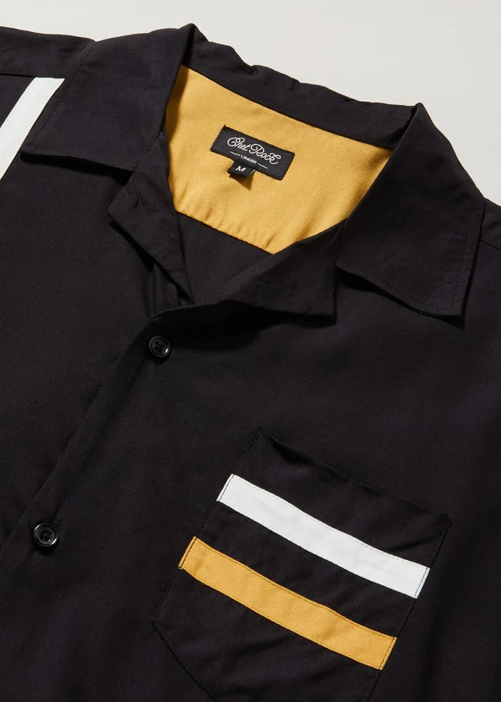 Mustard-gold and white striped chest pocket on the Chet Rock Crossley Shirt