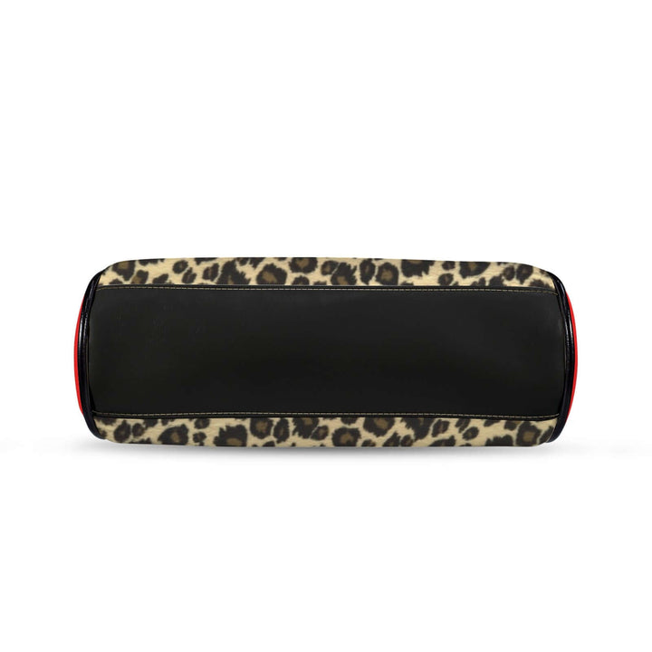 Kisslock Vintage Handbag Purse in La Cheetah print with black leather accents, showcased from the underside view.