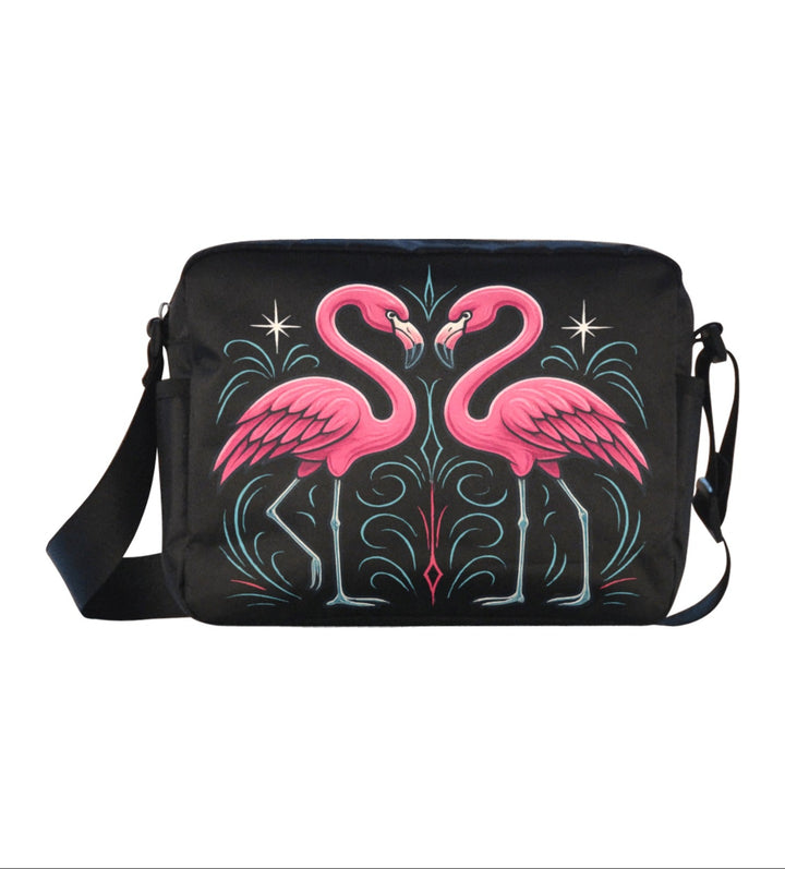 Black bag with pink flamingo design on a white background