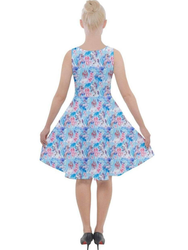 Back view of a knee-length skater dress in blue unicorn watercolour print, featuring a fit and flare design.