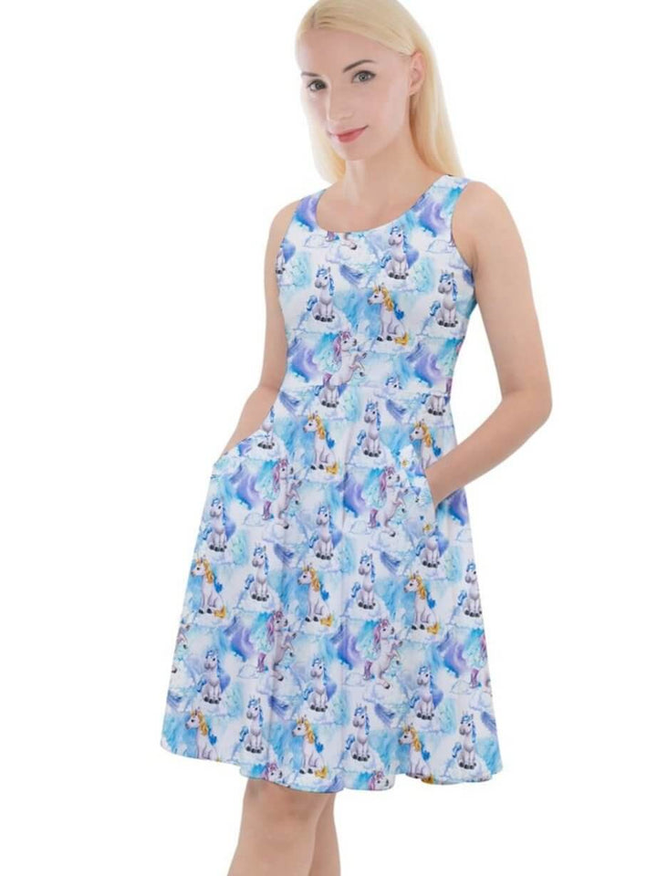 Knee-length fantasy unicorn skater dress featuring vibrant prints and convenient pockets for style and comfort.