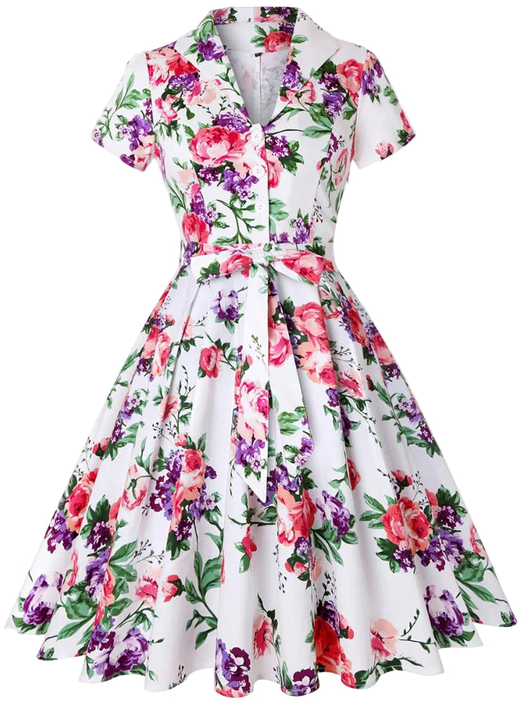 Floral dress with colorful flowers on a white background, brand 'April Moda' visible.
