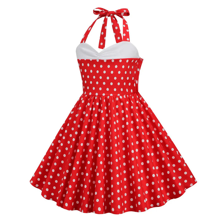 Girls polka dot halter rockabilly dress in red with white dots, knee-length A-line silhouette perfect for twirling.