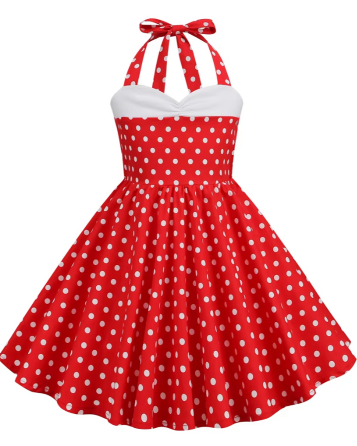 Girls red polka dot halter rockabilly dress with A-line silhouette and knee-length cut, perfect for playful occasions.