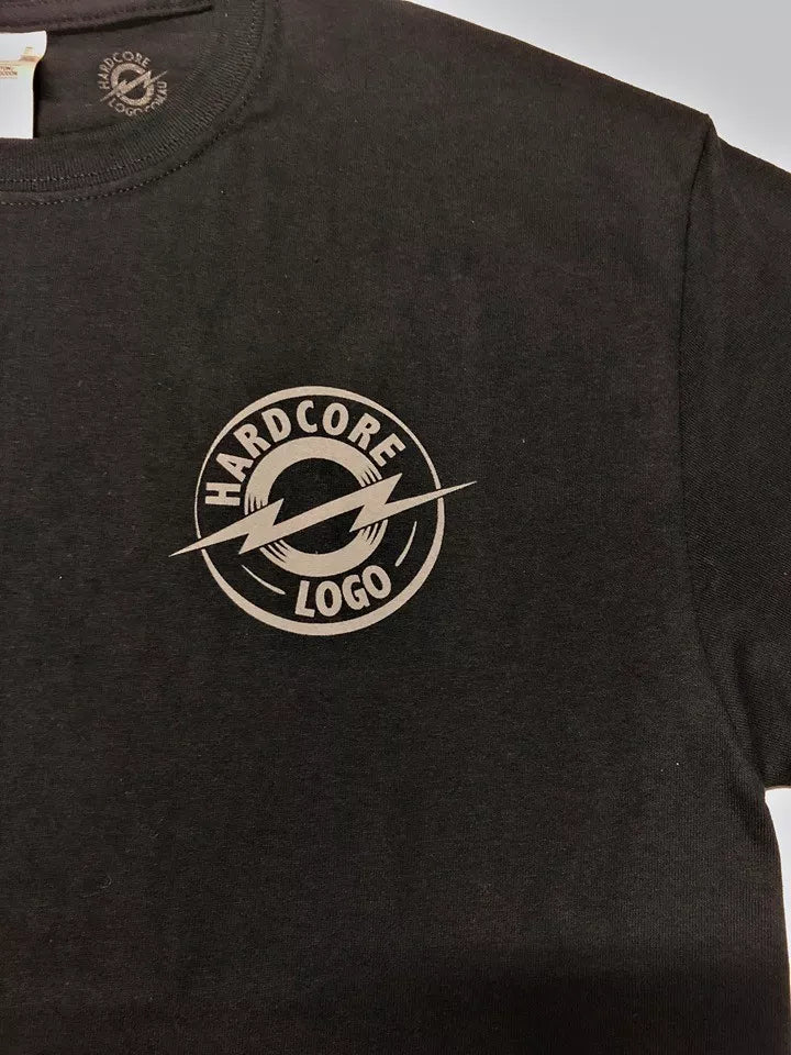 Hardcore Logo men's t-shirt close-up, printed in Australia, Gildan shirt, simple design on black fabric.