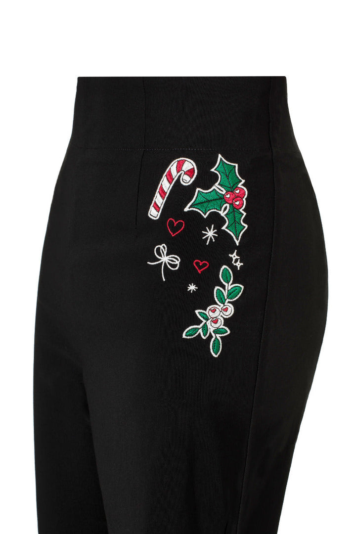Detail view of the black bengaline fabric and tailoring on Hell Bunny Natalie capris