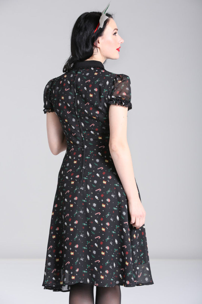 Back view of the Hell Bunny Natalie black Christmas chiffon midi dress on a regular-size model
