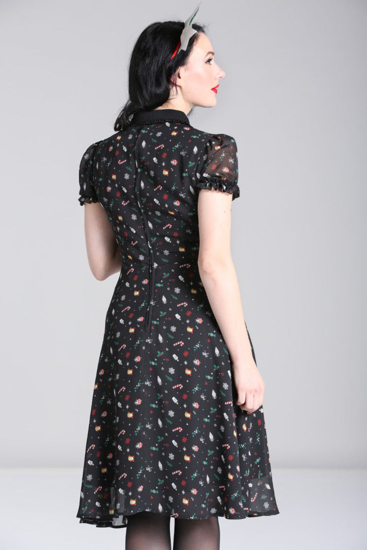Back view of the Hell Bunny Natalie black Christmas chiffon midi dress on a regular-size model