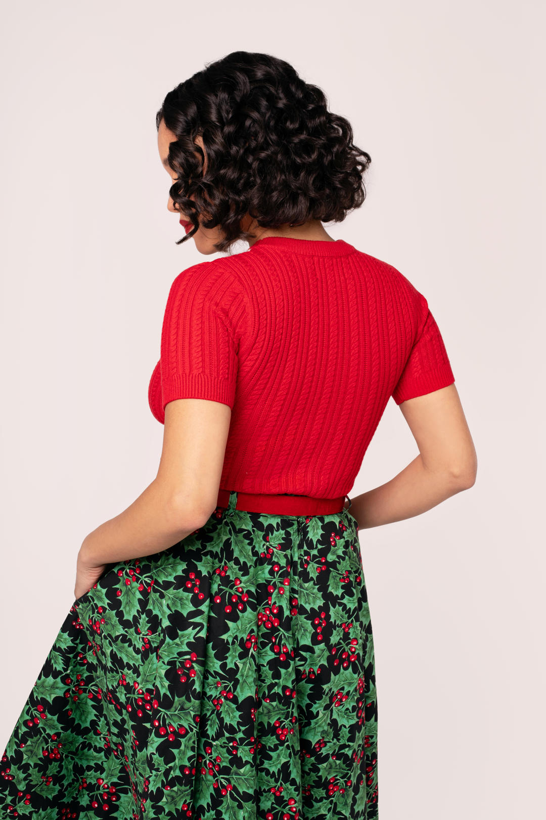 Back view of the Hell Bunny Poinsettia red short sleeve knit top