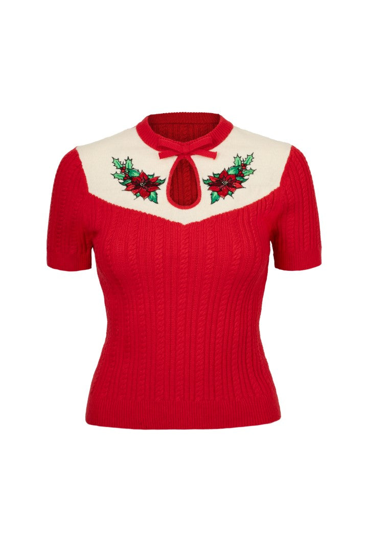 Close up of poinsettia embroidery on the Hell Bunny Poinsettia red knit top