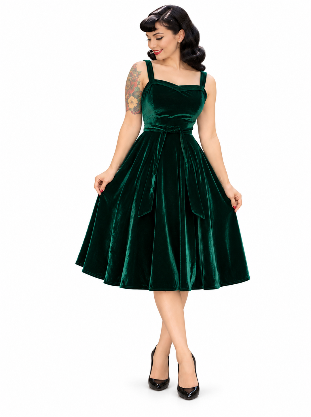 Hemet green velvet 1950s swing dress on white background with sweetheart neckline and full circle skirt