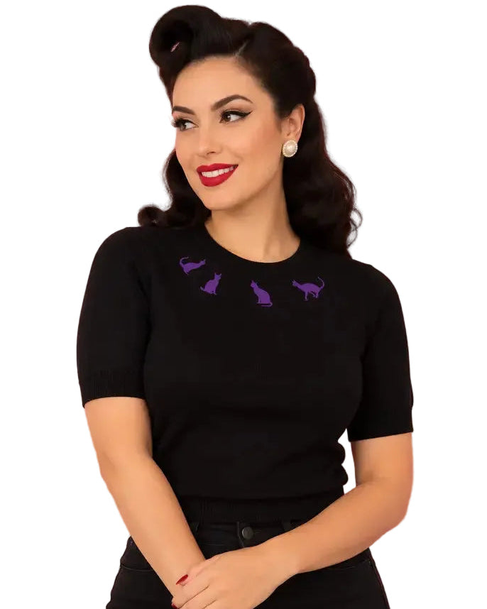 Hemet purple cat embroidered black knit top with short sleeves, worn with black jeans