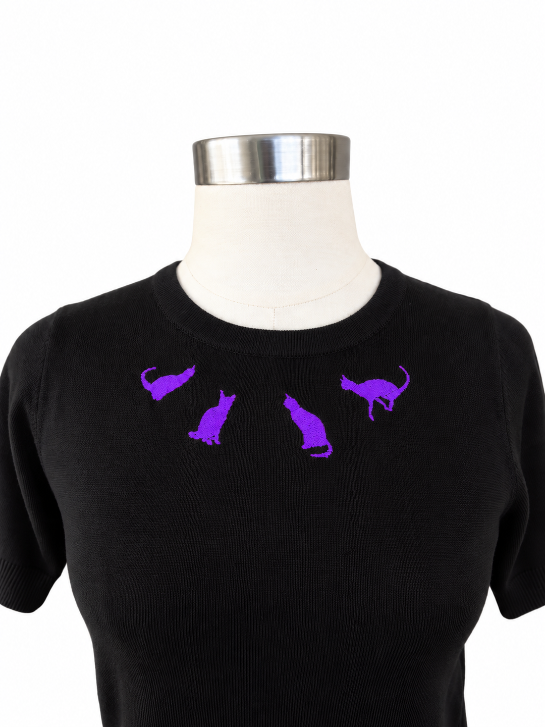 Hemet purple cat embroidered black knit top on white background