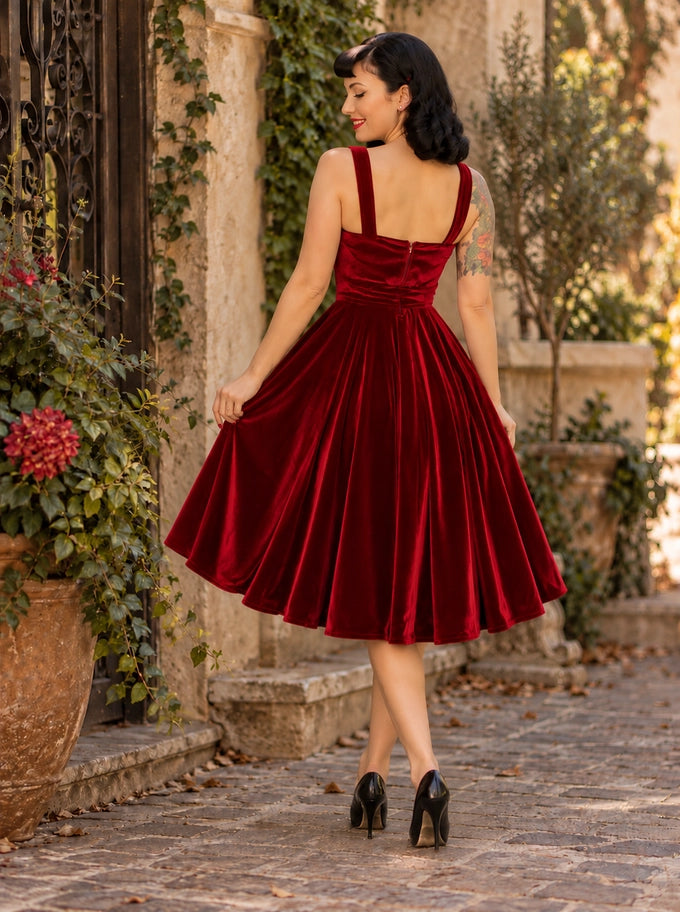 Hemet red velvet 1950s swing dress showing the back bodice and full circle skirt