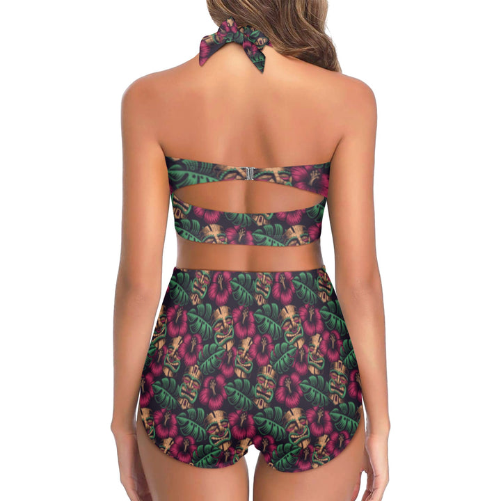 Back view of Leilani High Waist Bikini with vibrant tiki print and bow detail, perfect for tropical beach outings.