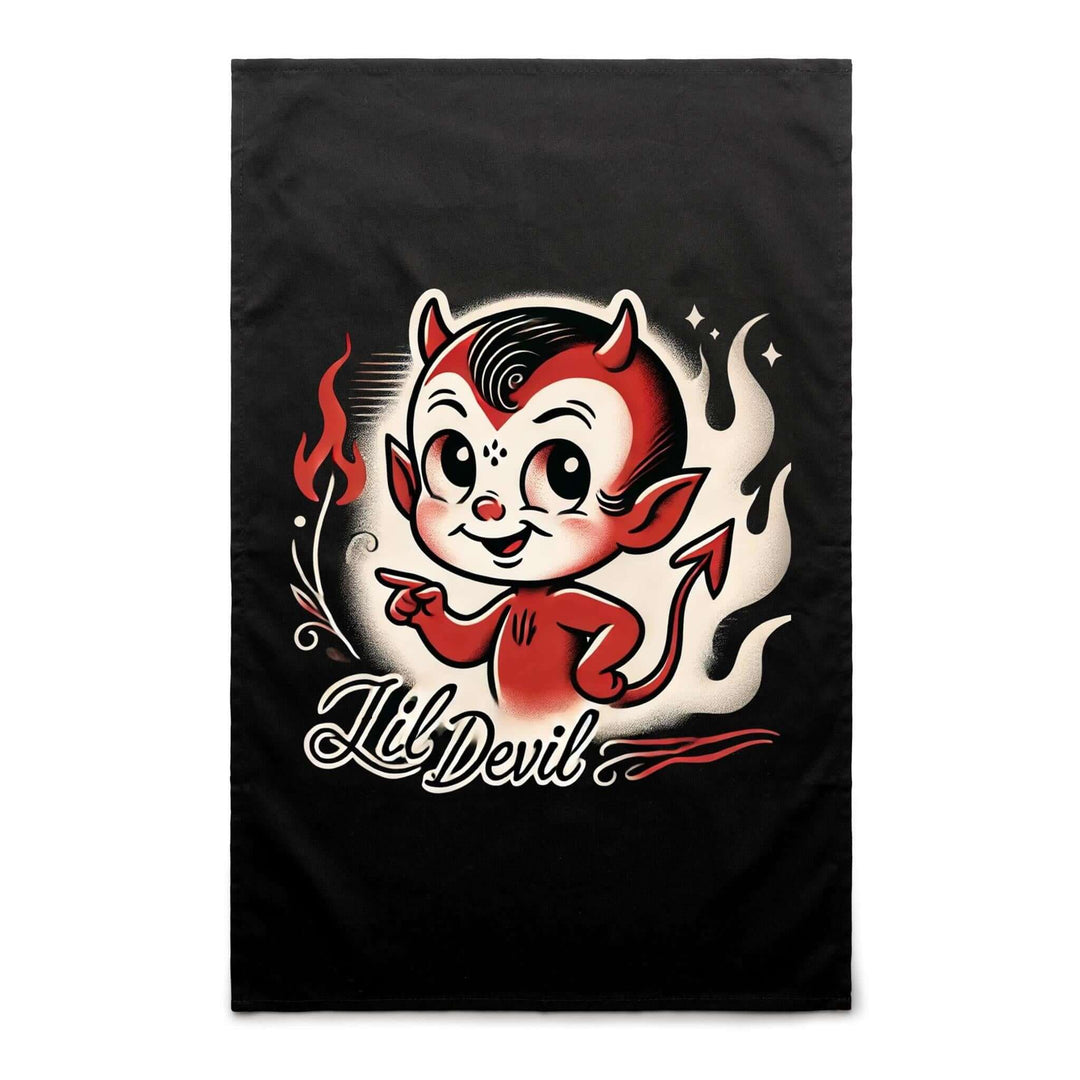 Lil Devil Tea Towel featuring a playful retro devil design with tattoo-style flames on a black background.
